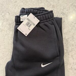 Nike charcoal grey Joggers with White Swoosh